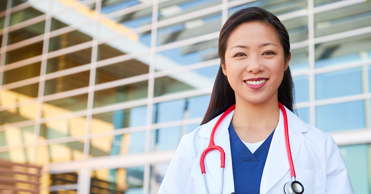international psa smiling doctor smiling female doctor outside hospital