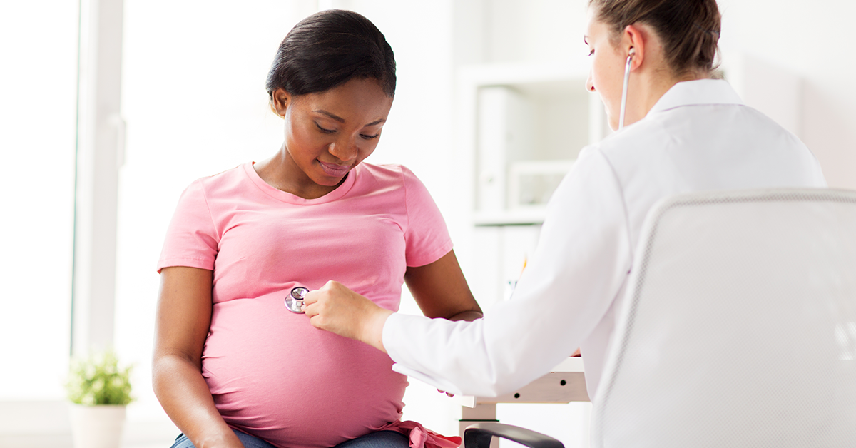 female doctor and pregnant patient